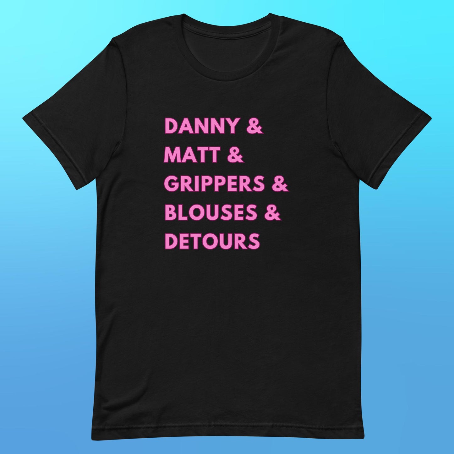 A black t-shirt that reads "Danny & Matt & Grippers & Blouses & Detours" in capital pink font.