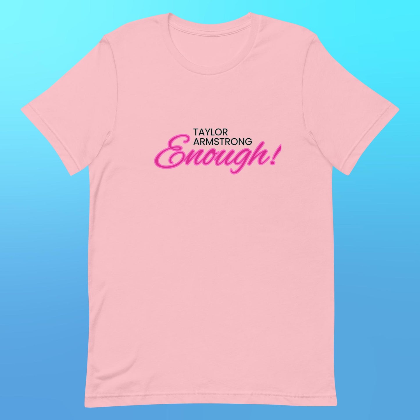 A pink t-shirt that reads "Taylor Armstrong ENOUGH!" in black and pink lettering.